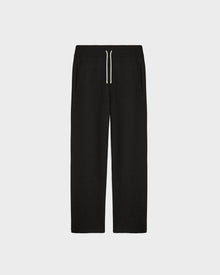 The Rudsak GEIGER - 9524512 Black M is a relaxed fit lounge pant with a white zipper.