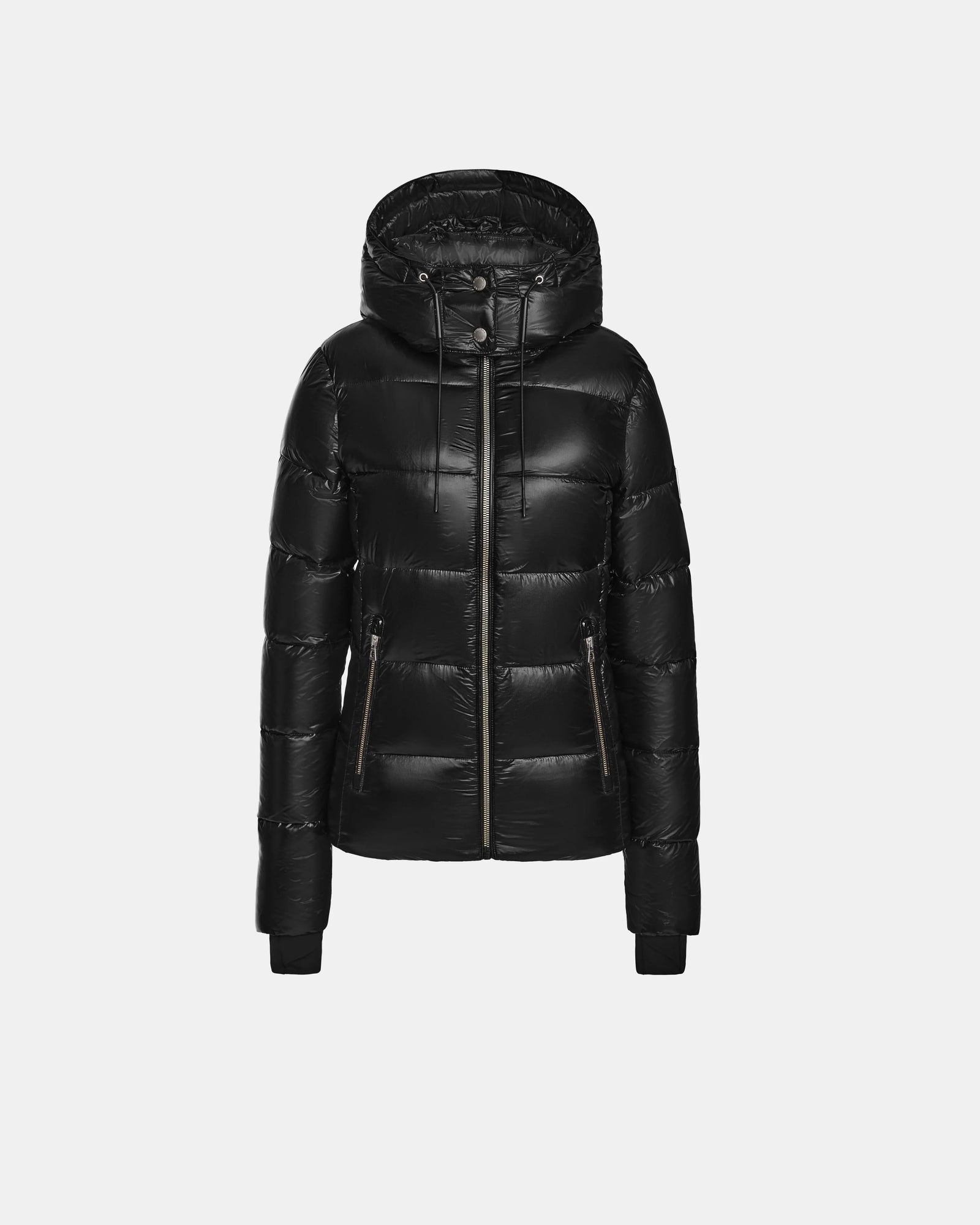 The Rudsak MIRRY S - L123545 Black is a womens quilted down puffer jacket with a hood, front zipper, two zippered side pockets, and ribbed cuffs, shown against a plain light gray background. Ideal as your go-to winter coat.