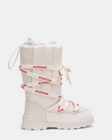 The RODIN - 8224502 Iceland by Rudsak is a womens winter boot with a chunky anti-slip sole, quilted upper, and cream straps with red Rudsak text, finished with a drawstring top for added warmth and style.