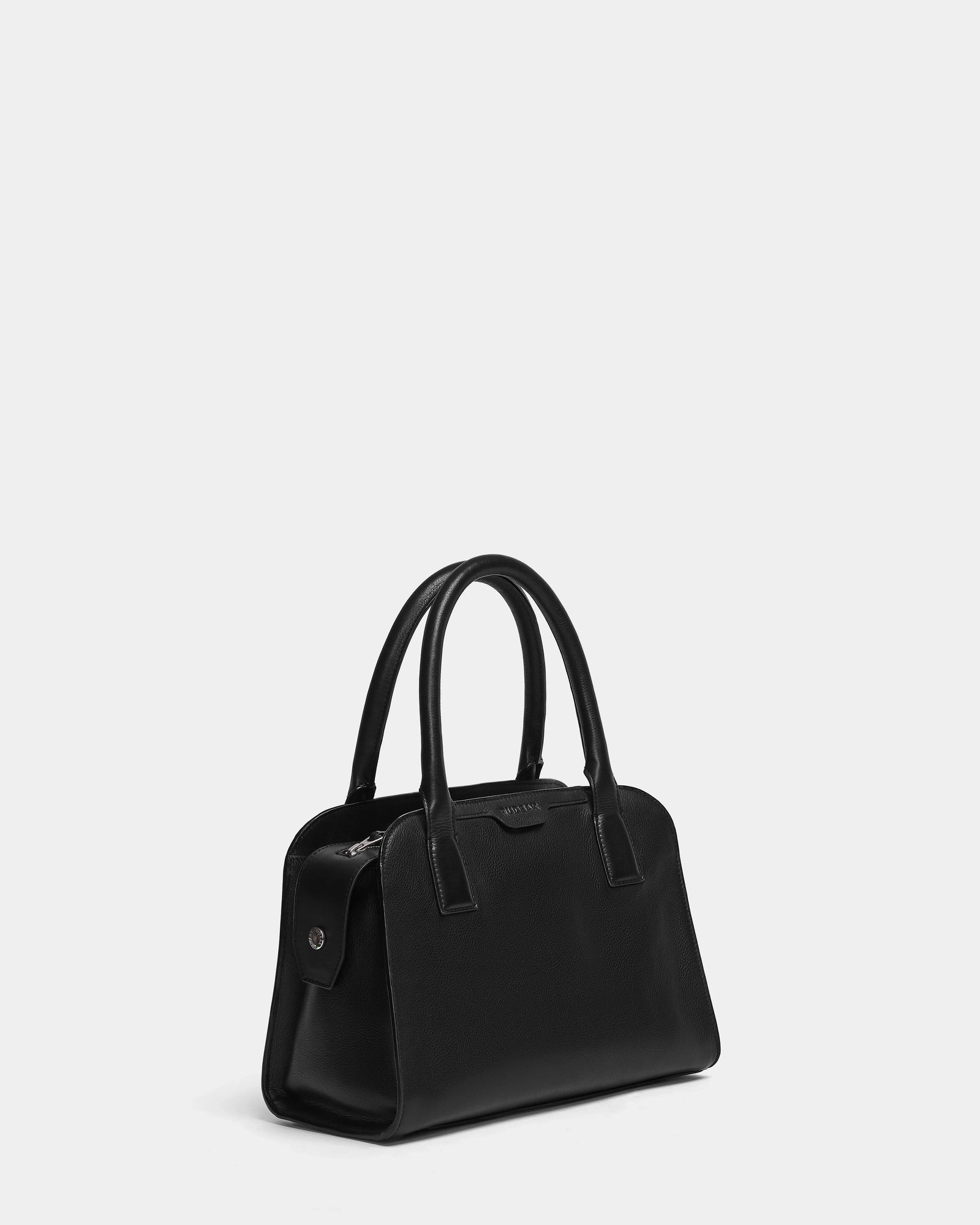 The Rudsak YASMINA - 8324527 Black is a luxury leather tote bag with two rounded handles and a simple rectangular design, shown against a plain light gray background.