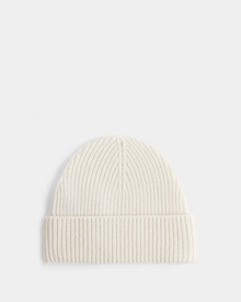 The ANDREY - U425507 Vanilla by Rudsak is an off-white rib-knit hat with a folded brim, shown on a light gray background.