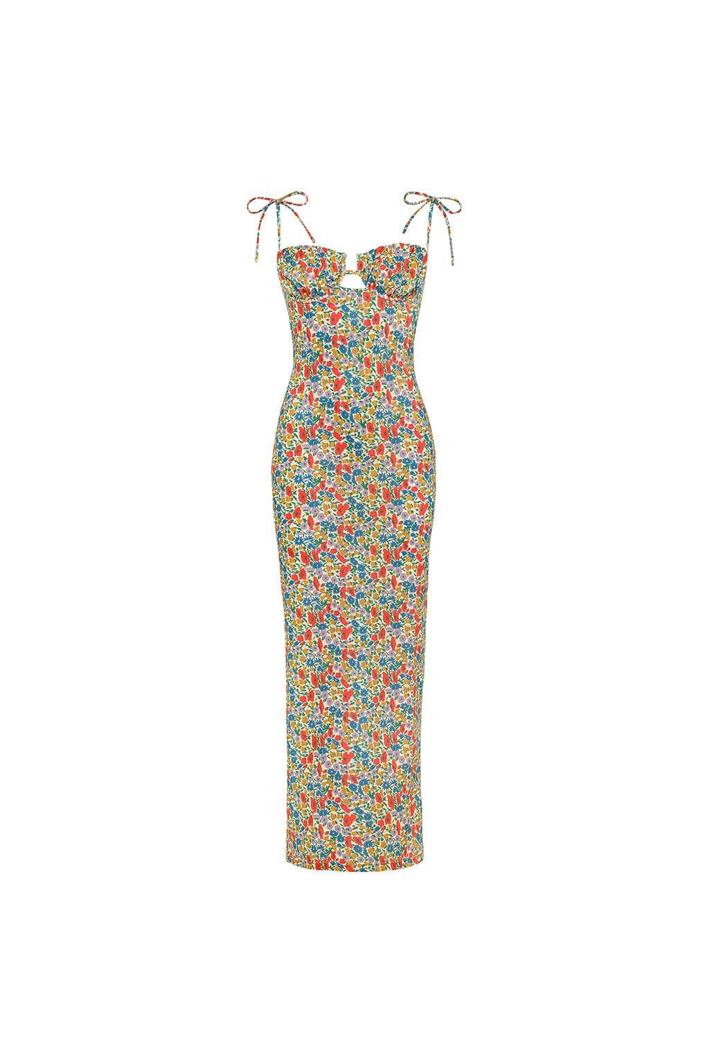 Long slip dress with multicolored floral print, sweetheart neckline, and tied shoulder straps.