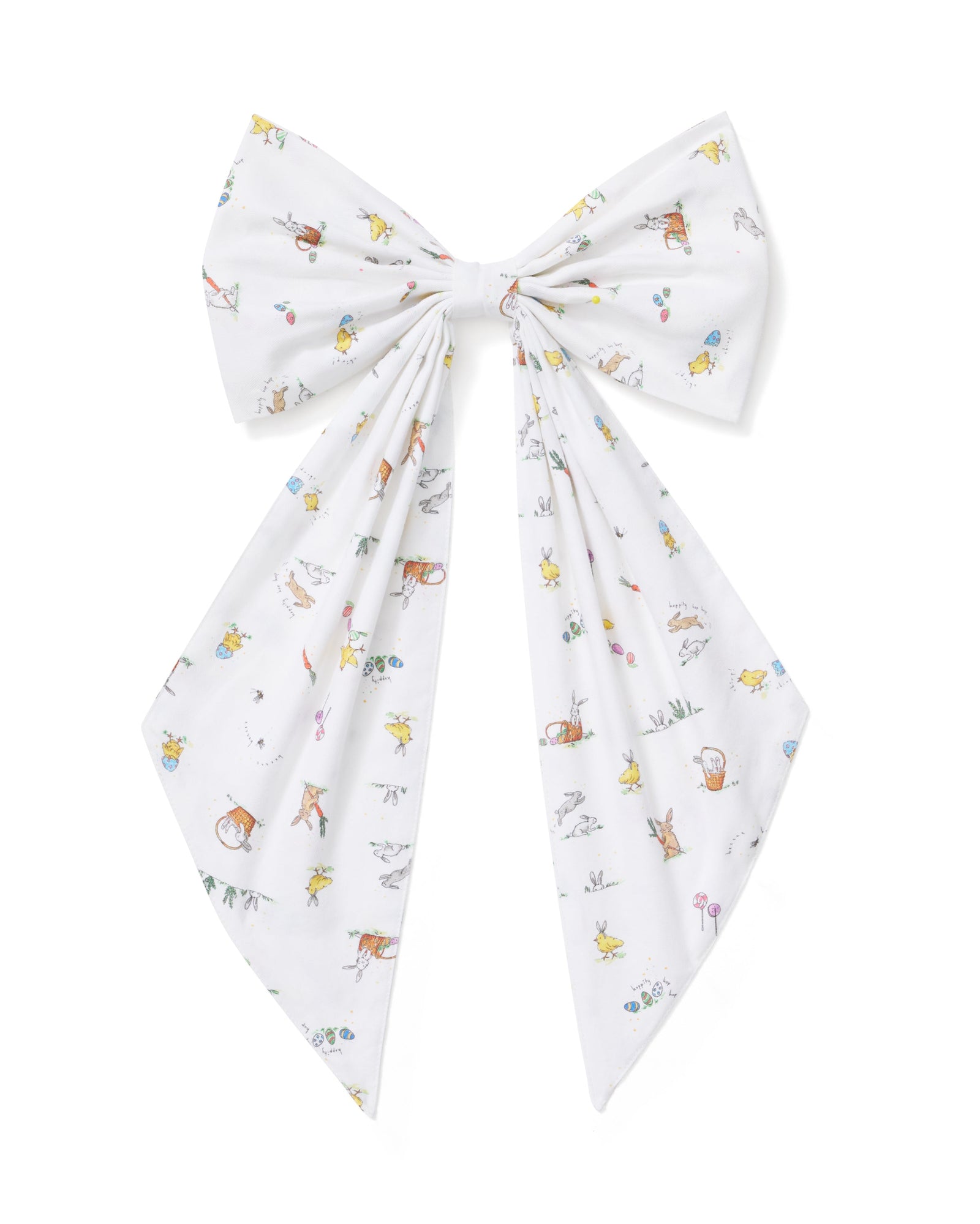 An Easter Basket and Wreath Bow in Easter Frolic with a large white bow featuring a pastel floral pattern is tied at the bottom of a wreath made of small white and pink flowers, hanging on a beige door.