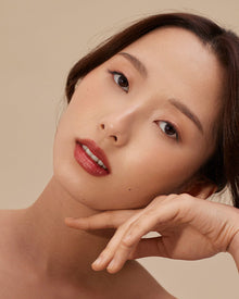 Luxury Lip Tint | Intrigue (Brick Red)