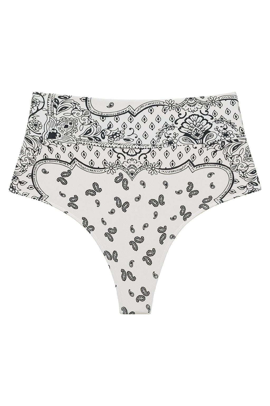 High-rise bikini bottom with black and white bandana print featuring paisleys, florals, and geometric patterns throughout.