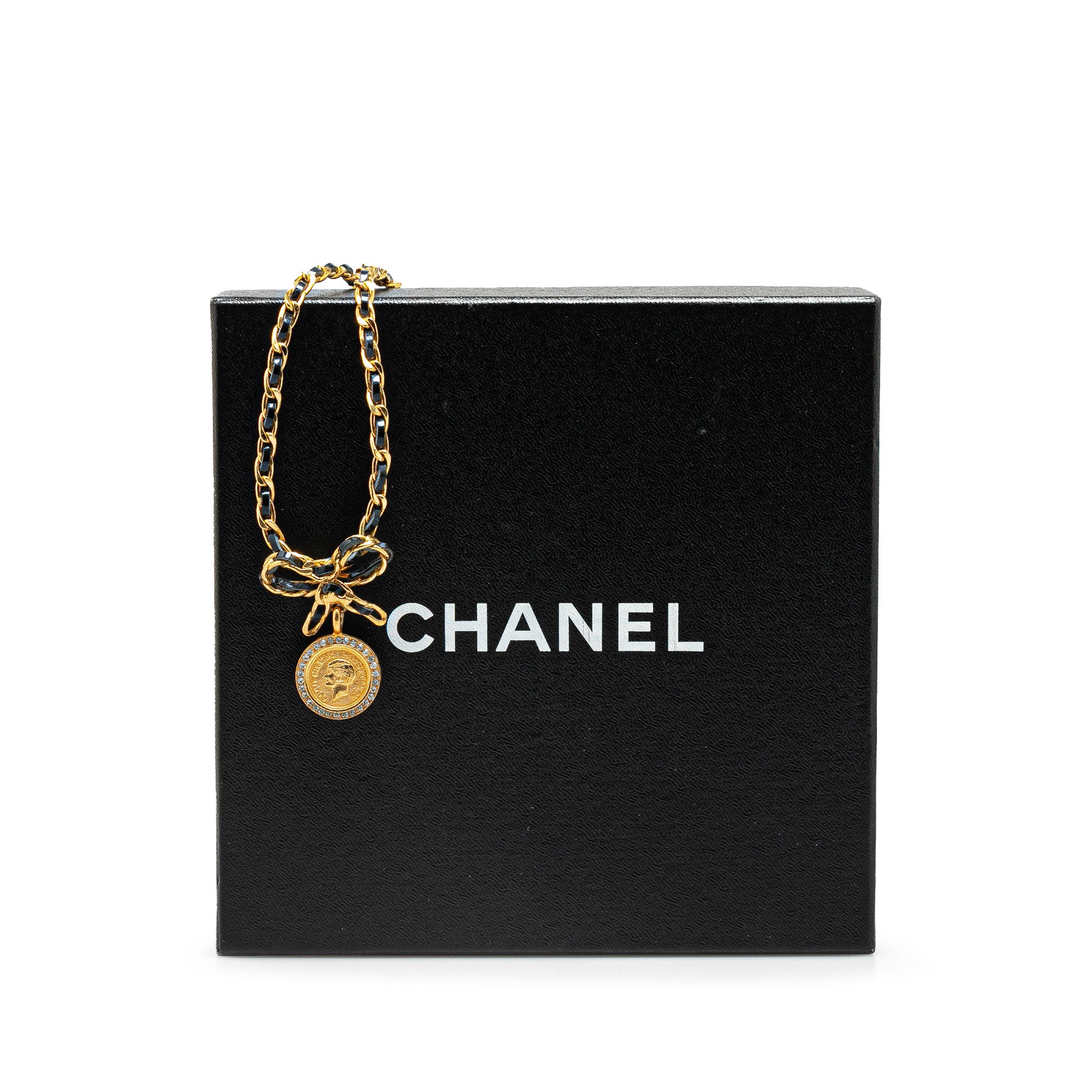 Chanel | Pre-Owned Leather and Gold Plated Medallion Bow Pendant Necklace | Gold
