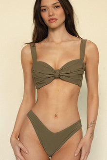 Khaki bikini bottom with added coverage and zig-zag stitch detailing, shown on model wearing matching top.