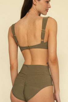 Khaki bikini top with adjustable shoulder straps and metal buckle back closure, shown from rear view.