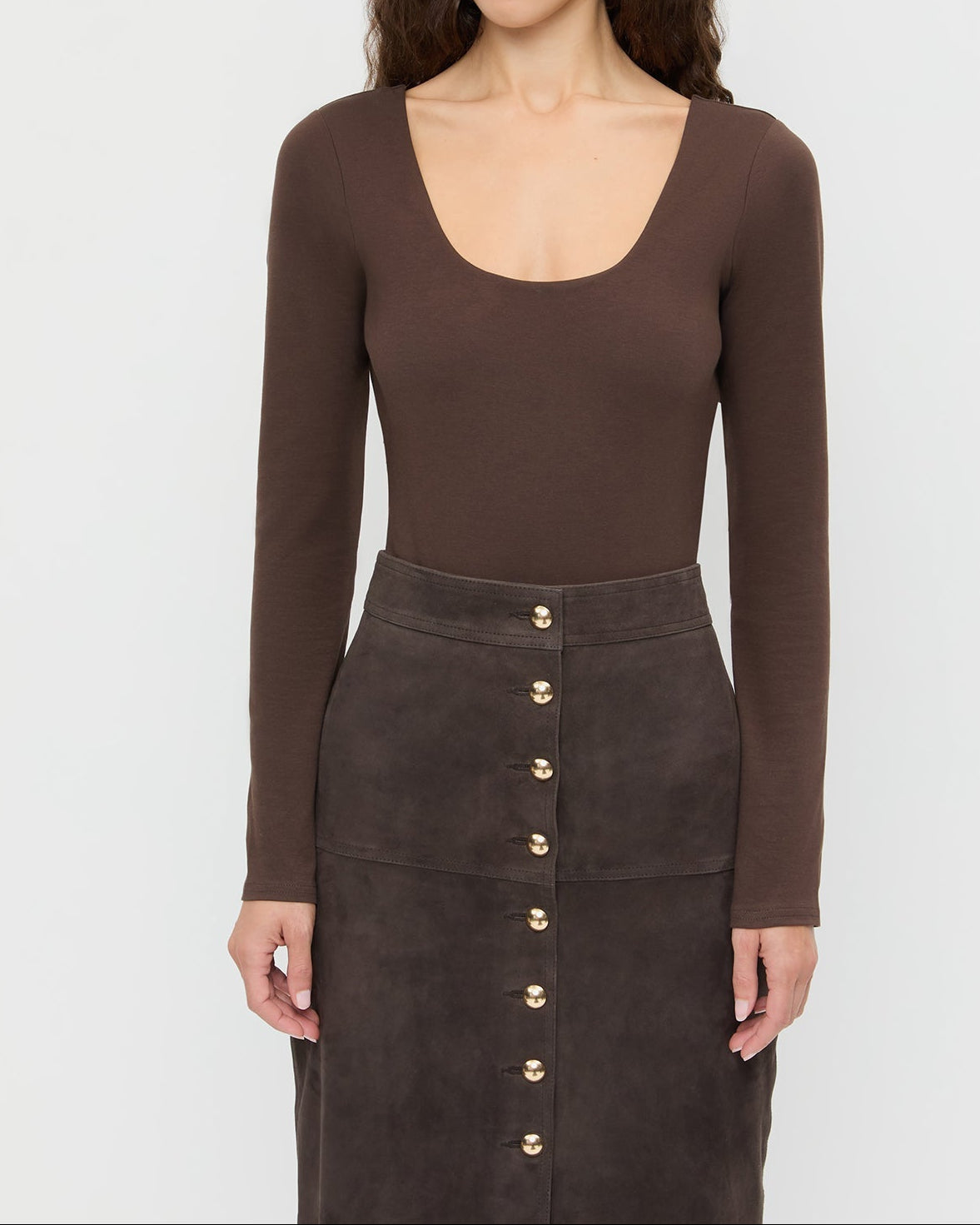 Lumi Long-Sleeve Bodysuit in chocolate brown jersey fabric and Tansy Suede Skirt in brown suede.