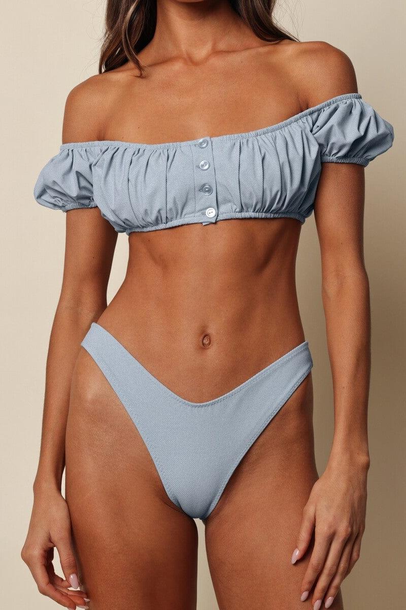 Light denim bandita bikini top with gathered off-shoulder design and front button closure.