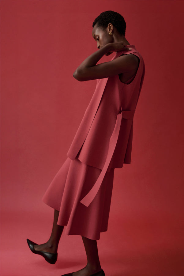 side image of a woman wearing the anh jardigan in carnation | Exclude | ALT GRID