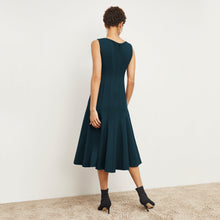 back image of a woman wearing the gabriella dress in deep sea