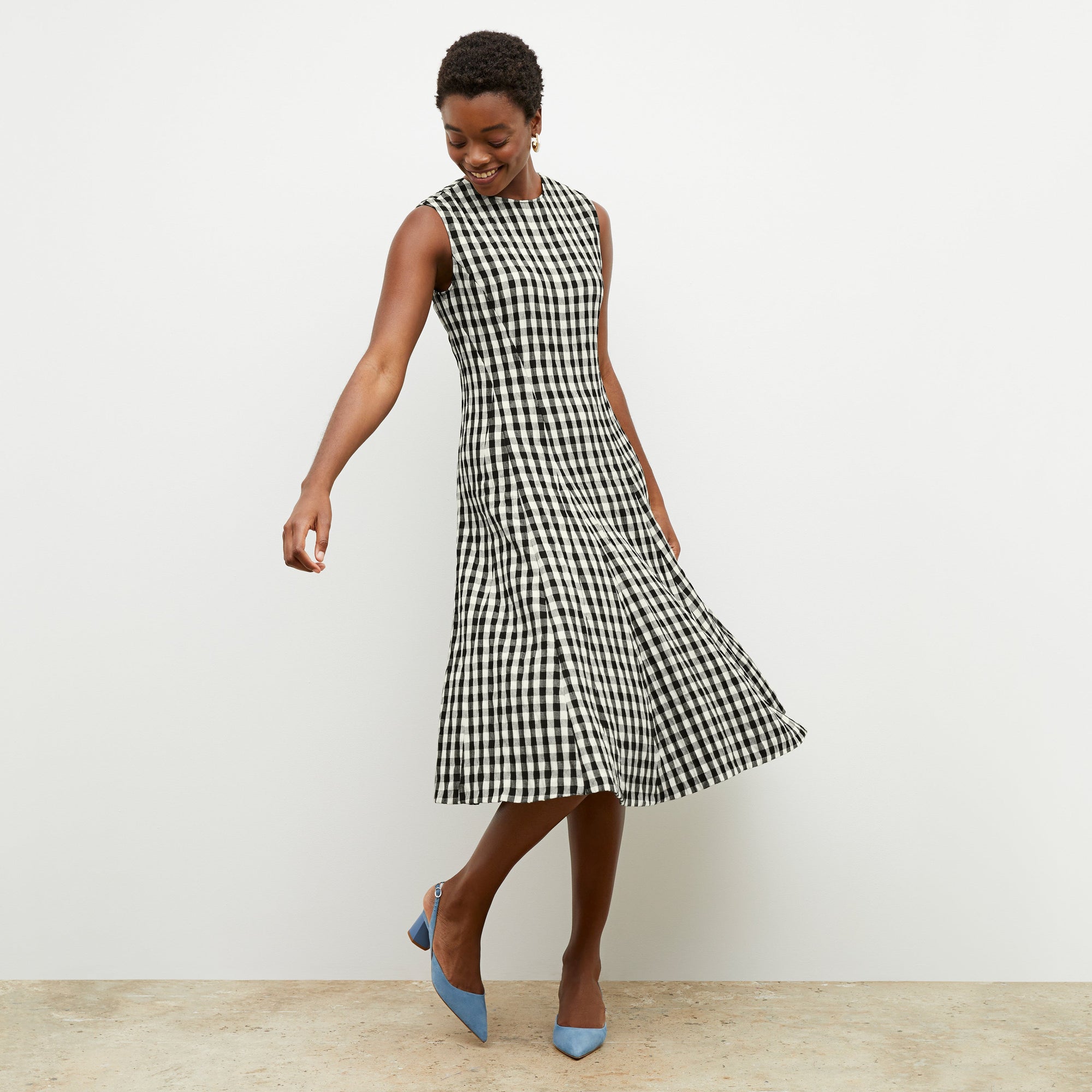 image of the woman wearing the irene slingback in sky blue