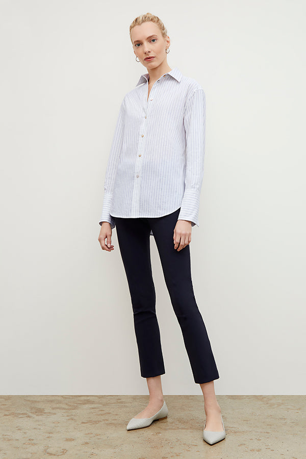 Front image of a woman standing wearing the foster pant in dark navy | Grid Hover | Exclude