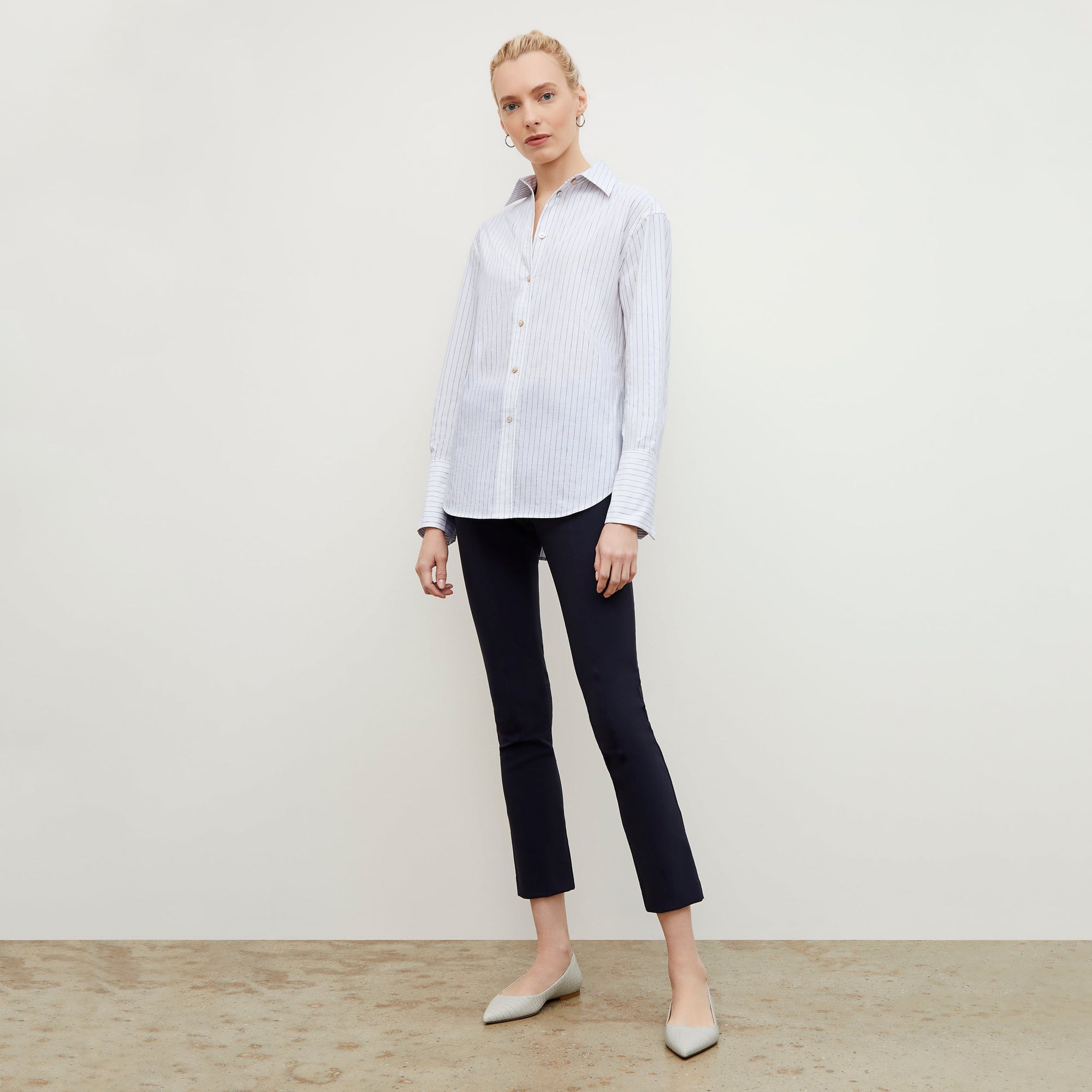 Front image of a woman wearing the Mila Button Down - Poplin Stripe in Blue / Ivory