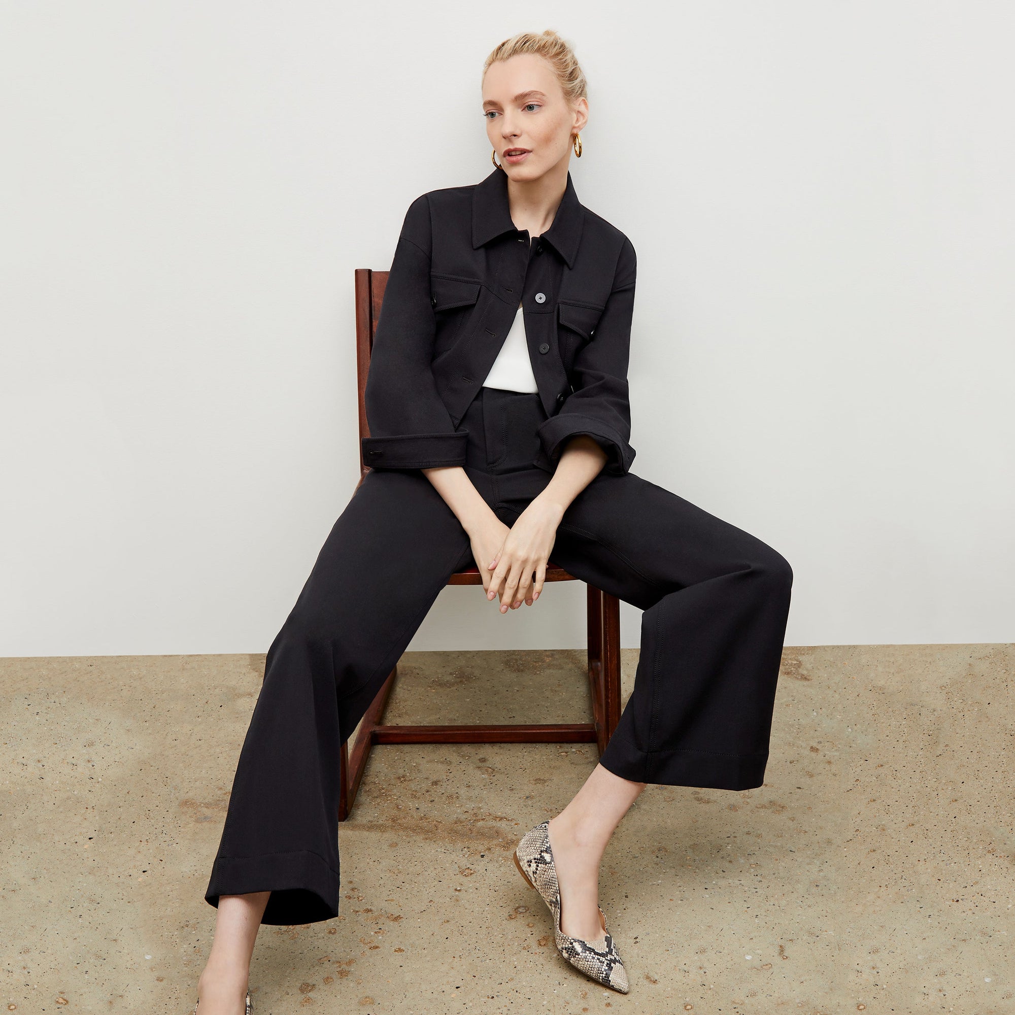Front image of a woman wearing the Milo Jean in Black | Exclude