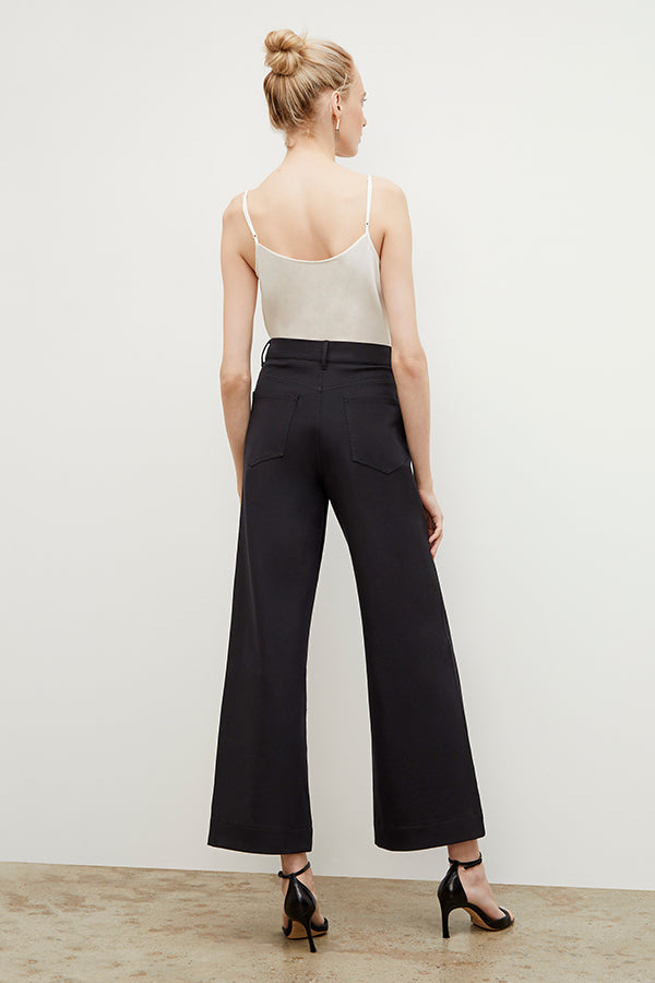 Back image of a woman wearing the Milo Jean in Black | Exclude