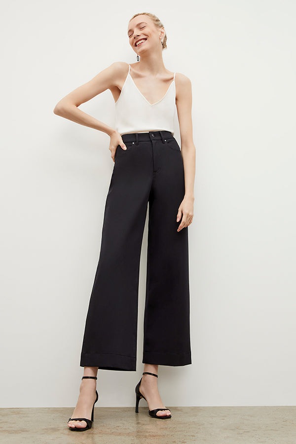 Front image of a woman wearing the Milo Jean in Black | Exclude | Grid Hover