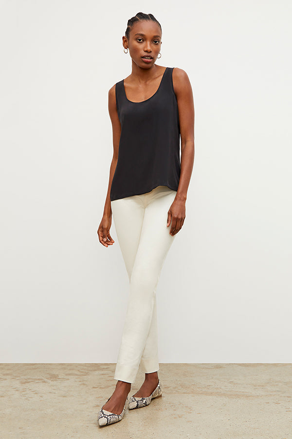 Front image of a woman standing wearing the Hockley Jean—Better Than Denim in Tusk | Exclude | Grid