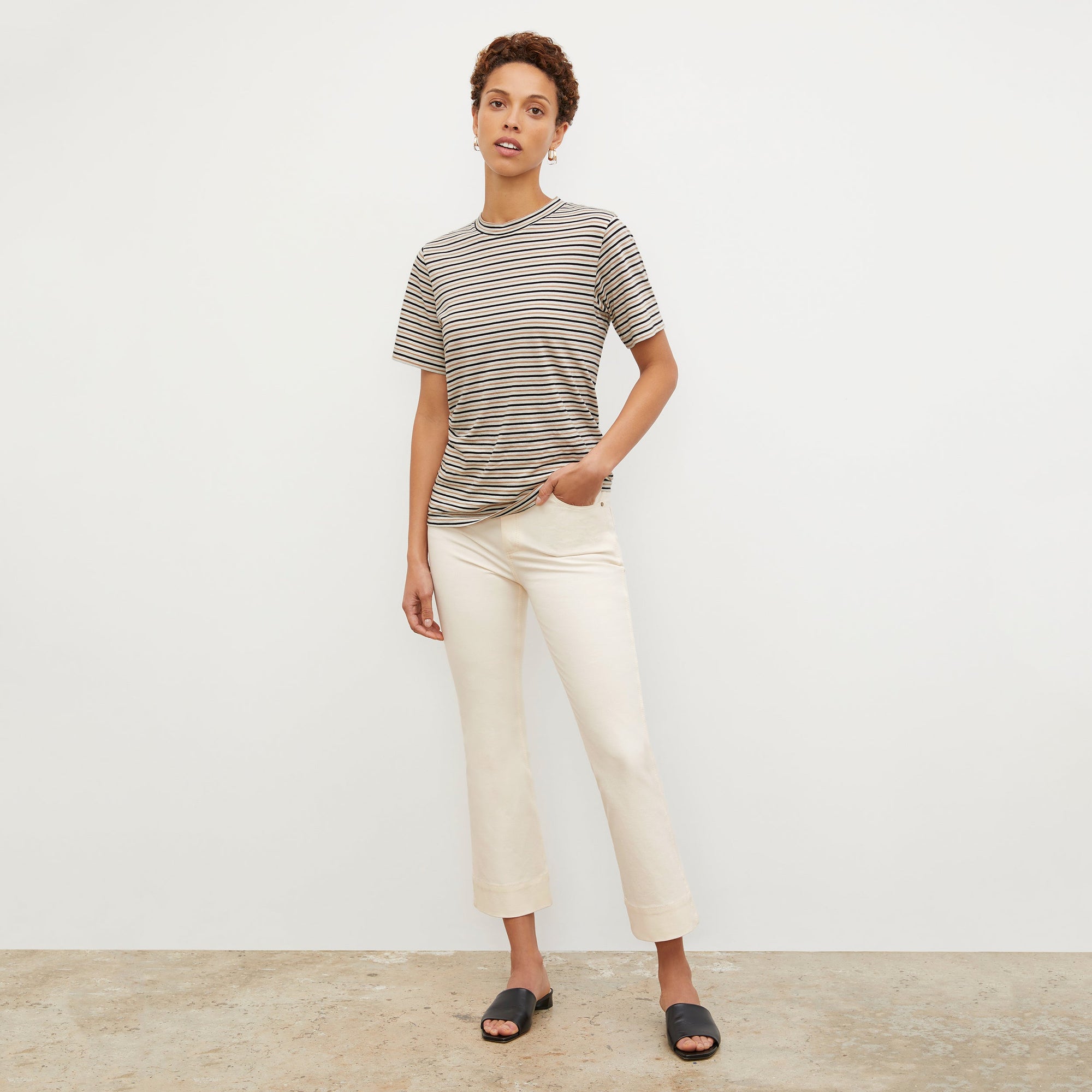 Front image of a woman wearing the Archie Jean in Tusk 