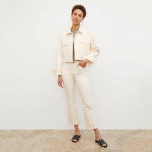 Front image of a woman wearing the Archie Jean in Tusk