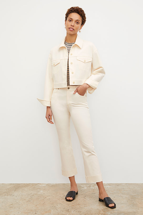 Front image of a woman wearing the Archie Jean in Tusk | Exclude