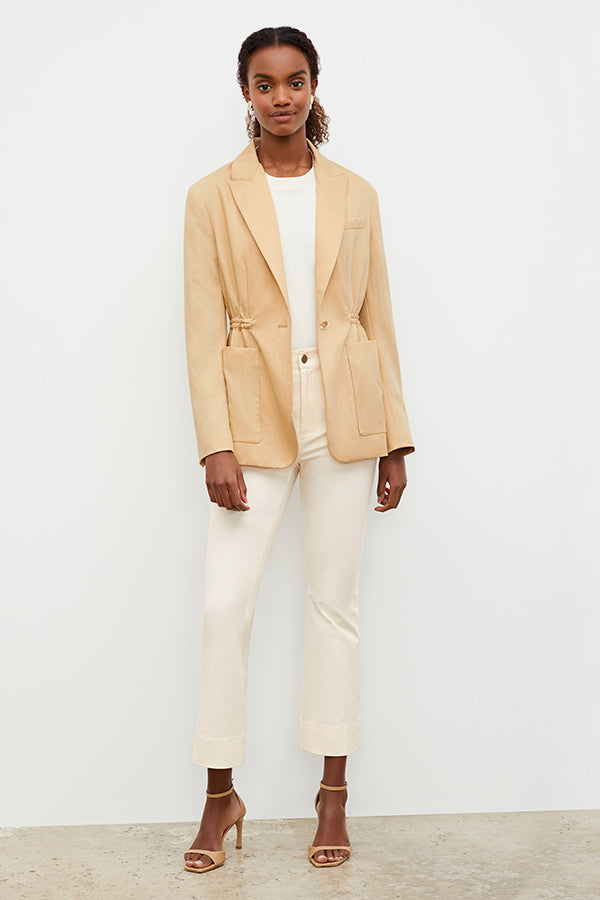 Front image of a woman wearing the Archie Jean in Tusk | Exclude