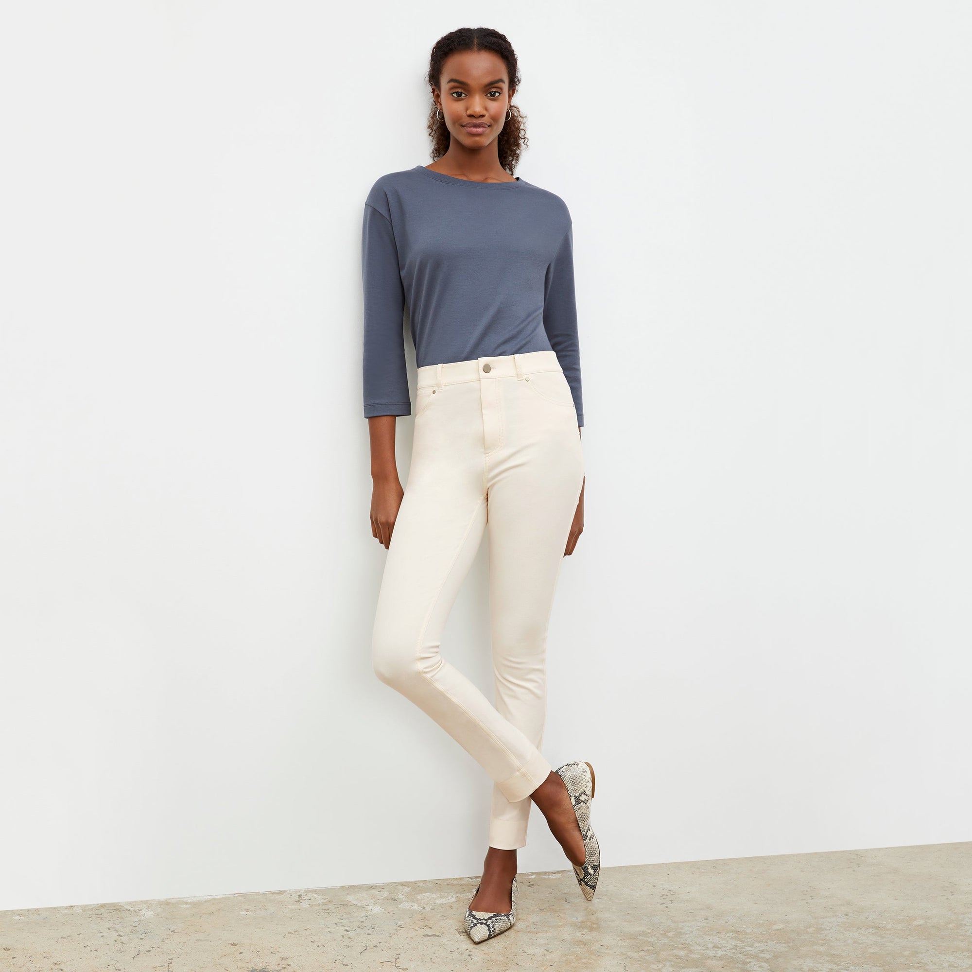 Front image of a woman wearing the Sammataro Jean in Tusk | Lead