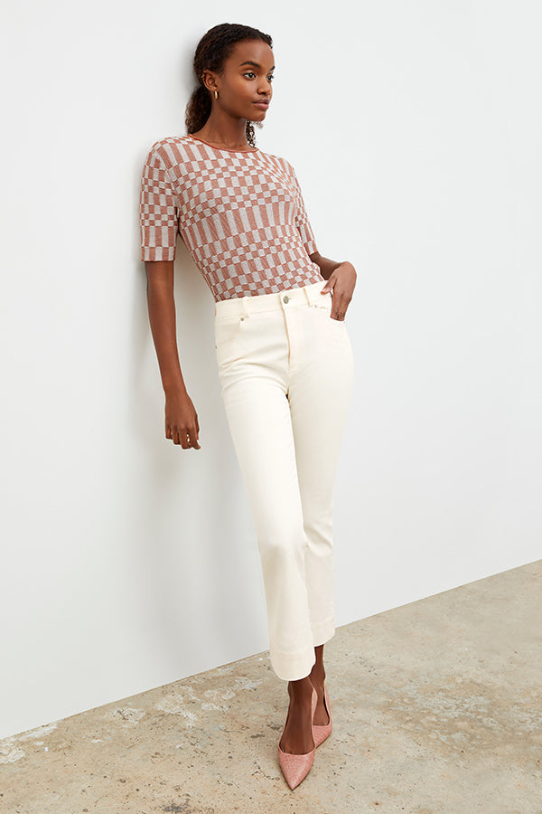 Front image of a woman wearing the Archie Jean in Tusk | Exclude