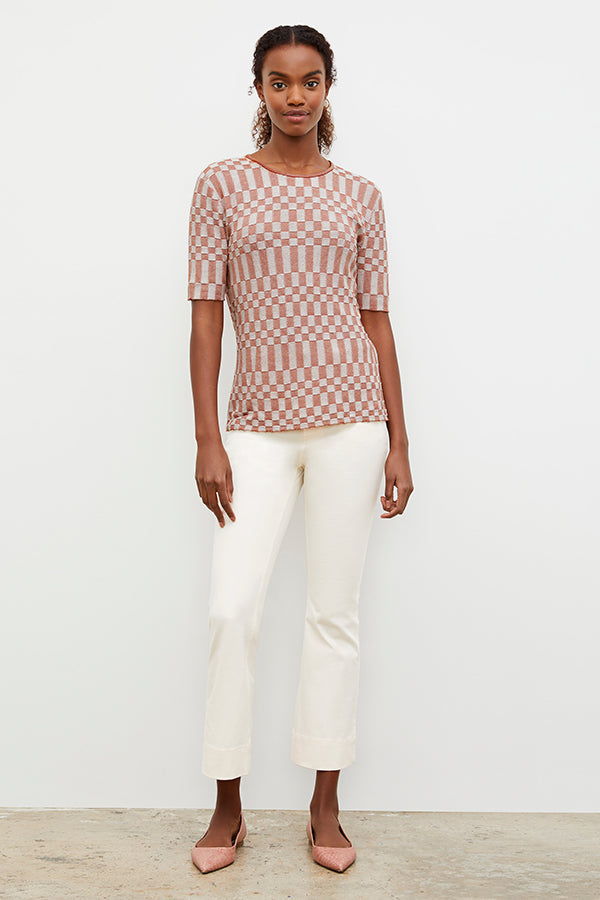 Front image of a woman wearing the Archie Jean in Tusk | Exclude