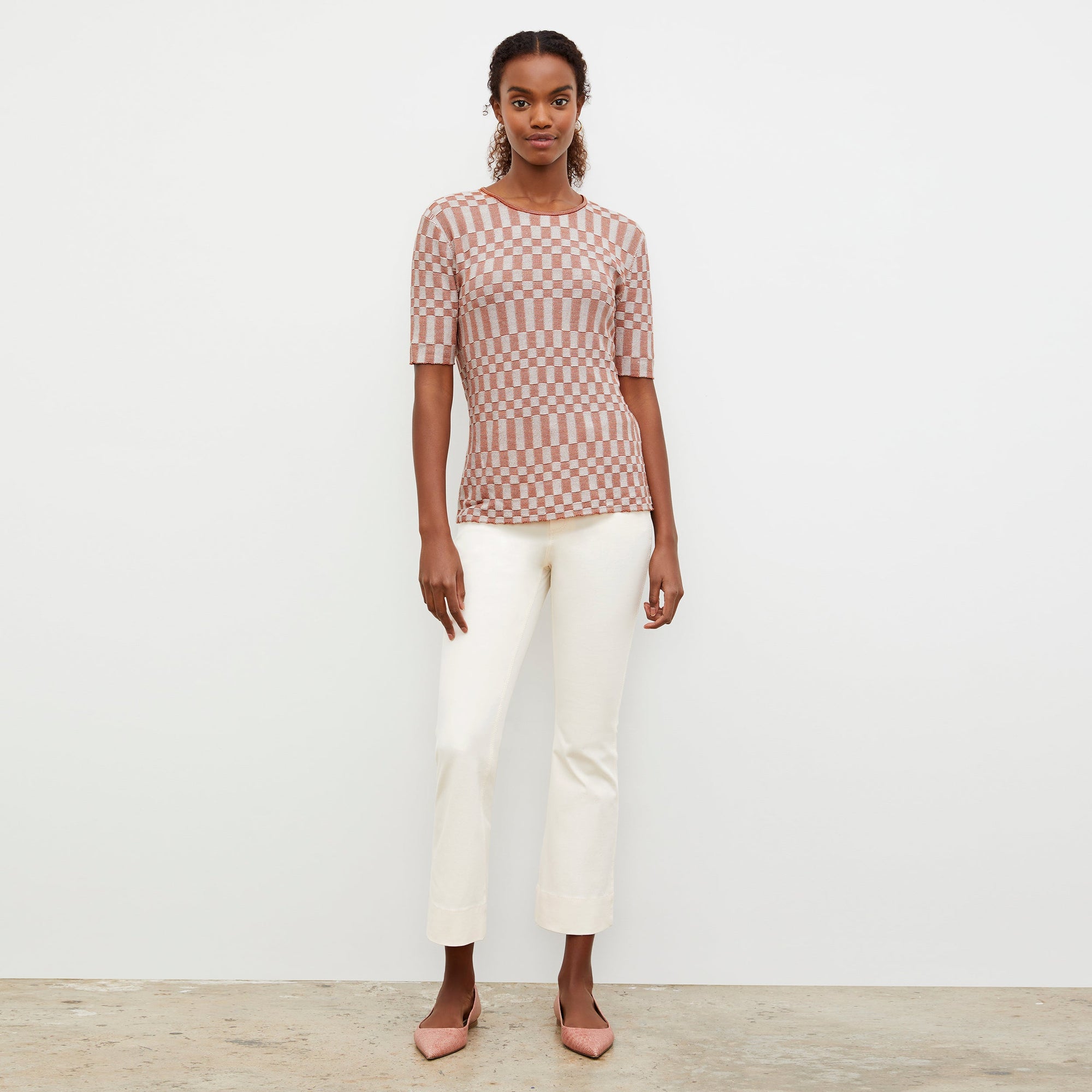 Front image of a woman wearing the Archie Jean in Tusk | Exclude
