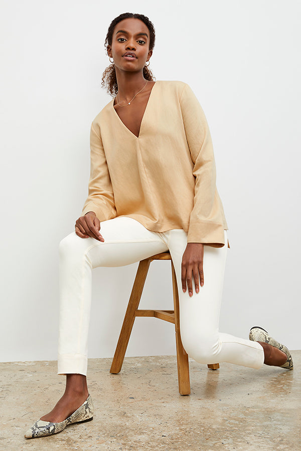 Front image of a woman standing wearing the Hockley Jean—Better Than Denim in Tusk | Exclude