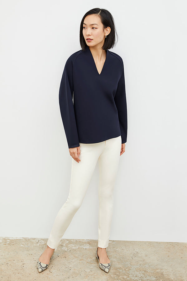 Front image of a woman standing wearing the Hockley Jean—Better Than Denim in Tusk | Exclude