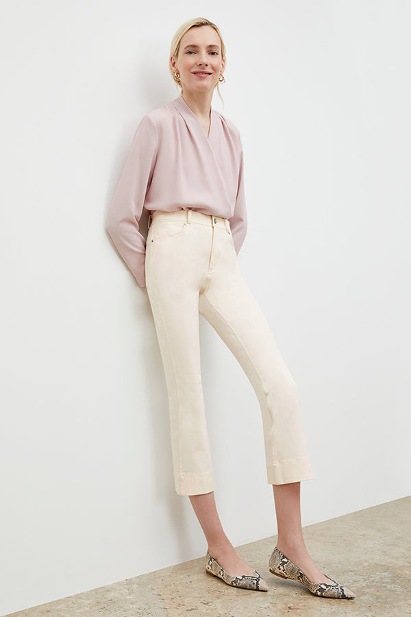 Front image of a woman wearing the Archie Jean in Tusk | Exclude