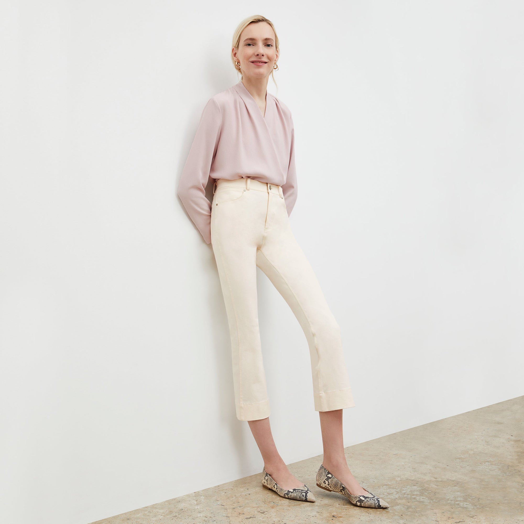 Front image of a woman wearing the Archie Jean in Tusk | Exclude