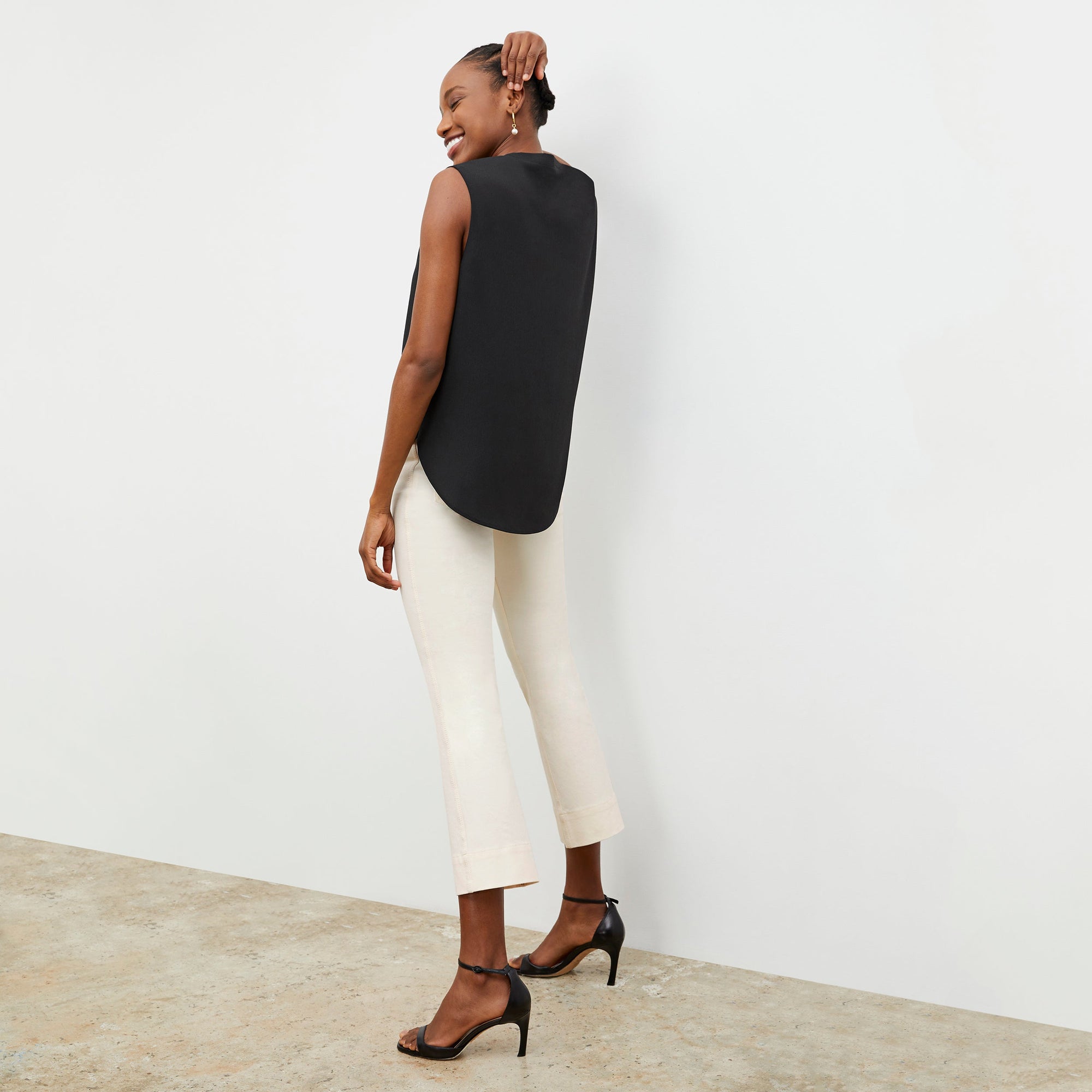 Front image of a woman wearing the Archie Jean in Tusk | Exclude