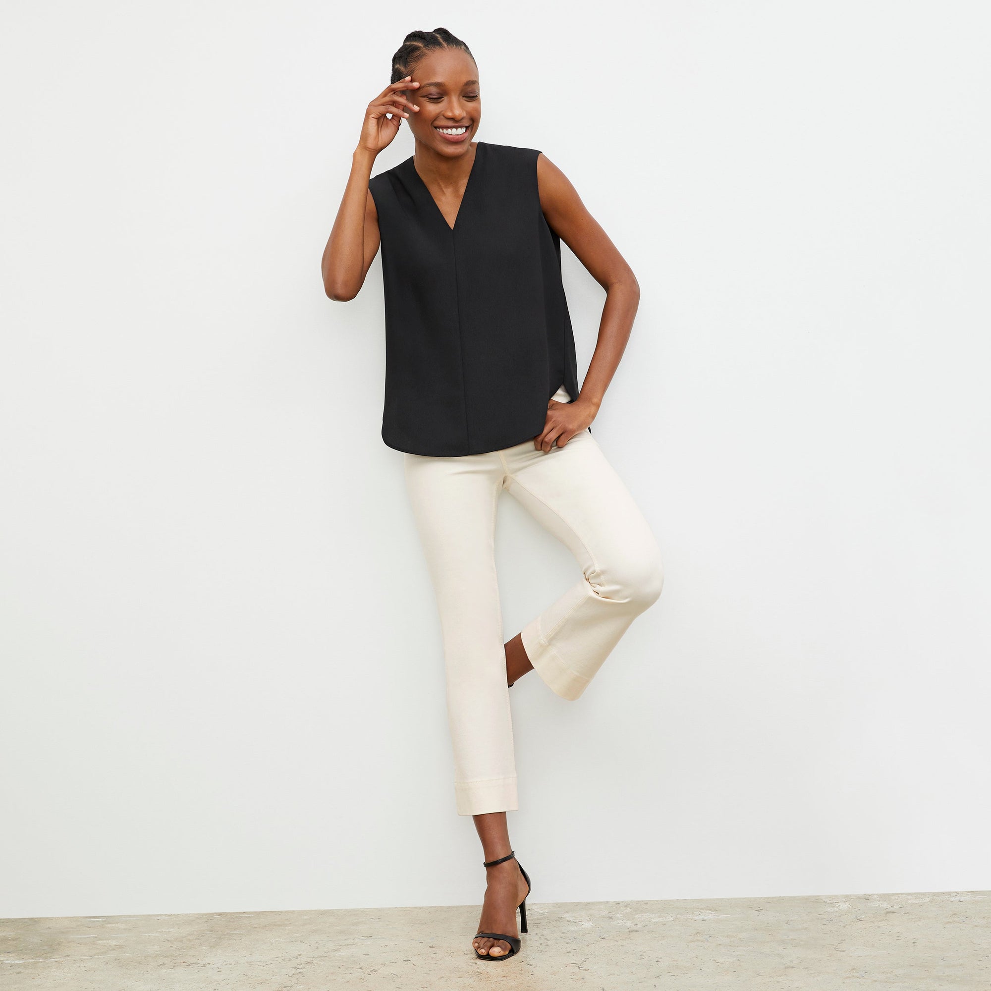 Front image of a woman wearing the Archie Jean in Tusk | Exclude