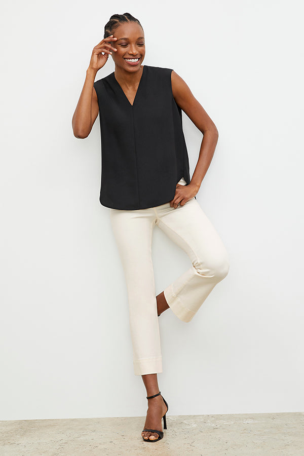 Front image of a woman wearing the Archie Jean in Tusk | Exclude 
