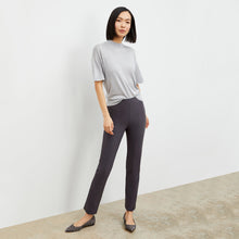 Front image of a woman standing wearing the foster pant in monsoon | Lead