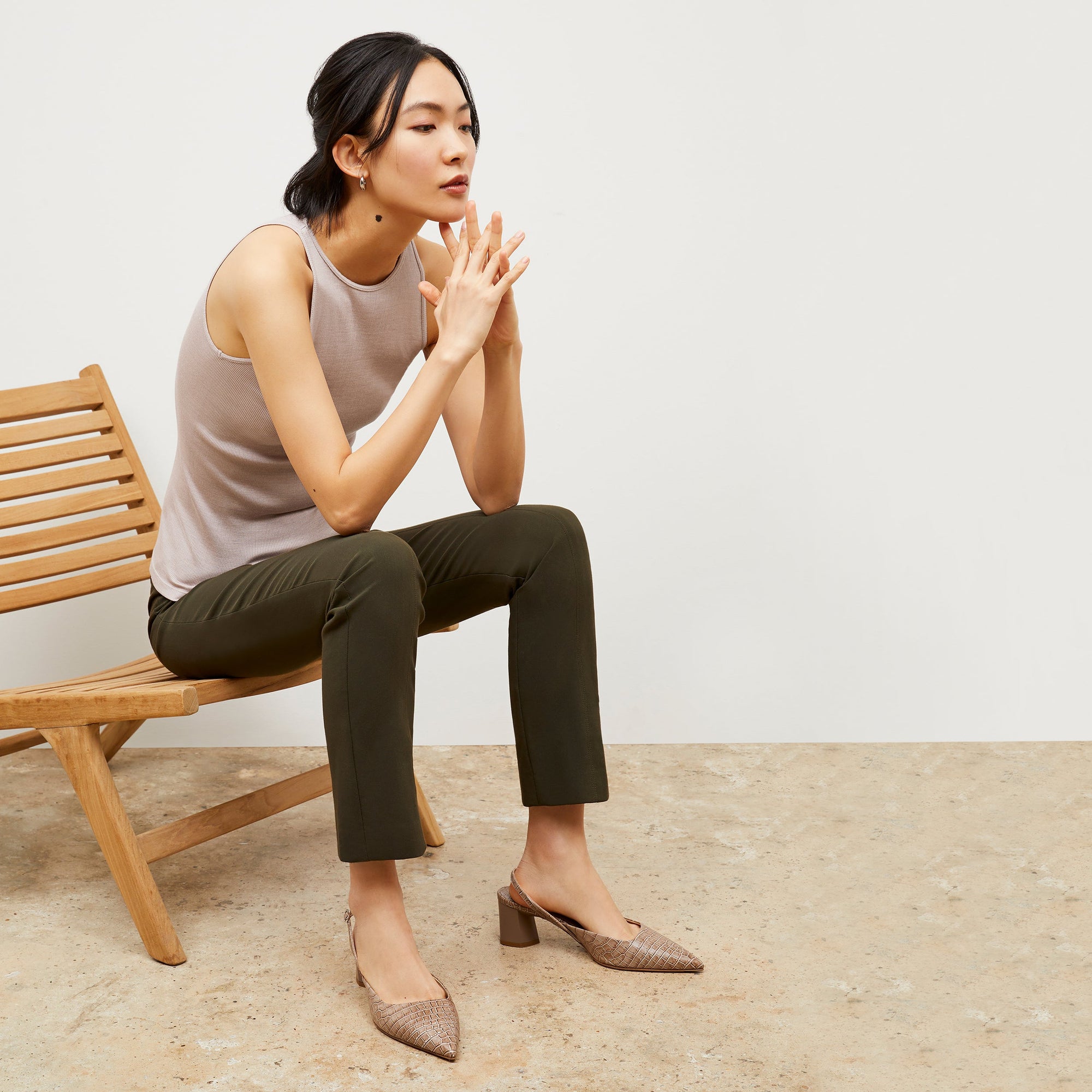 side image of woman wearing foster pant in dark olive | Exclude