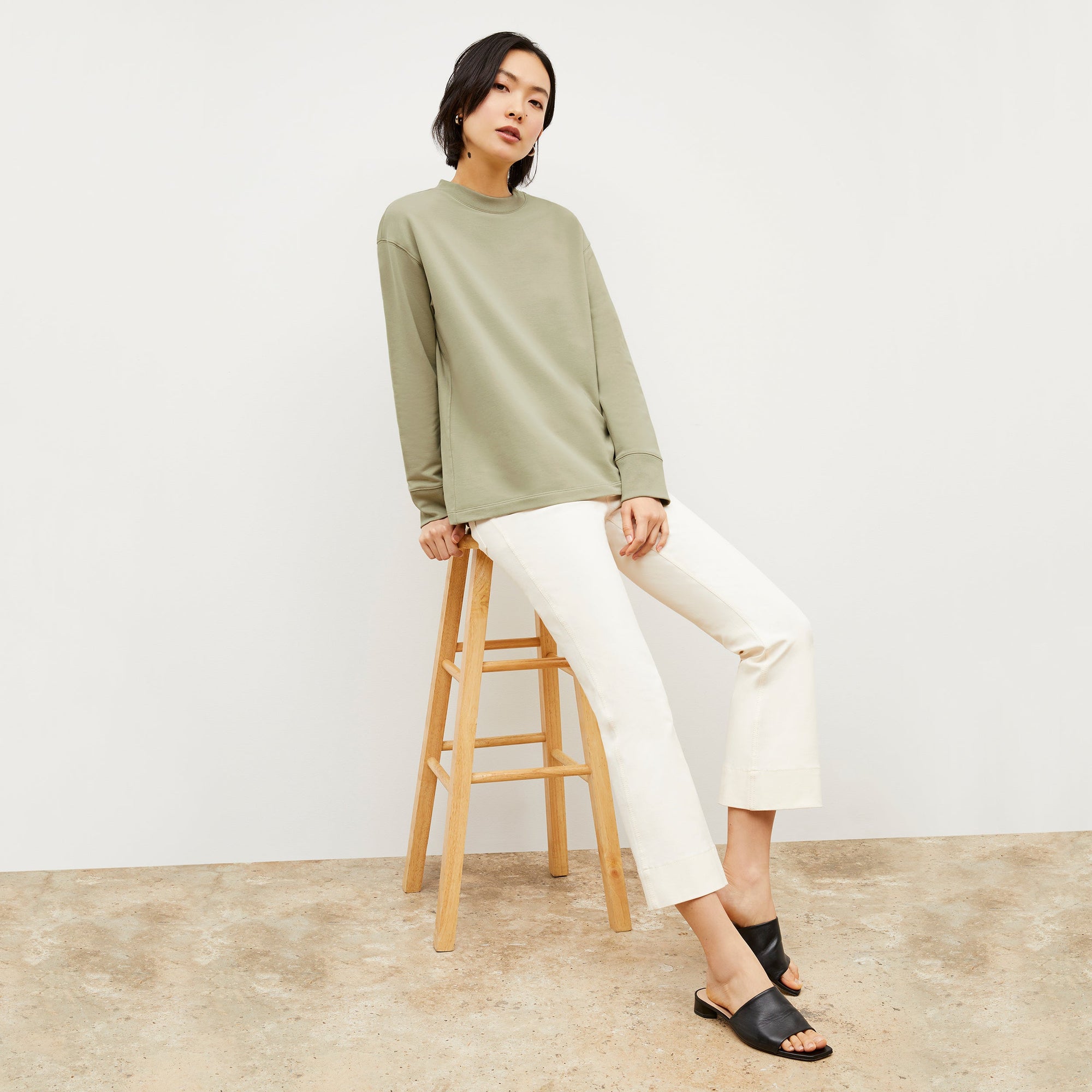 Front image of a woman wearing the Archie Jean in Black | Exclude