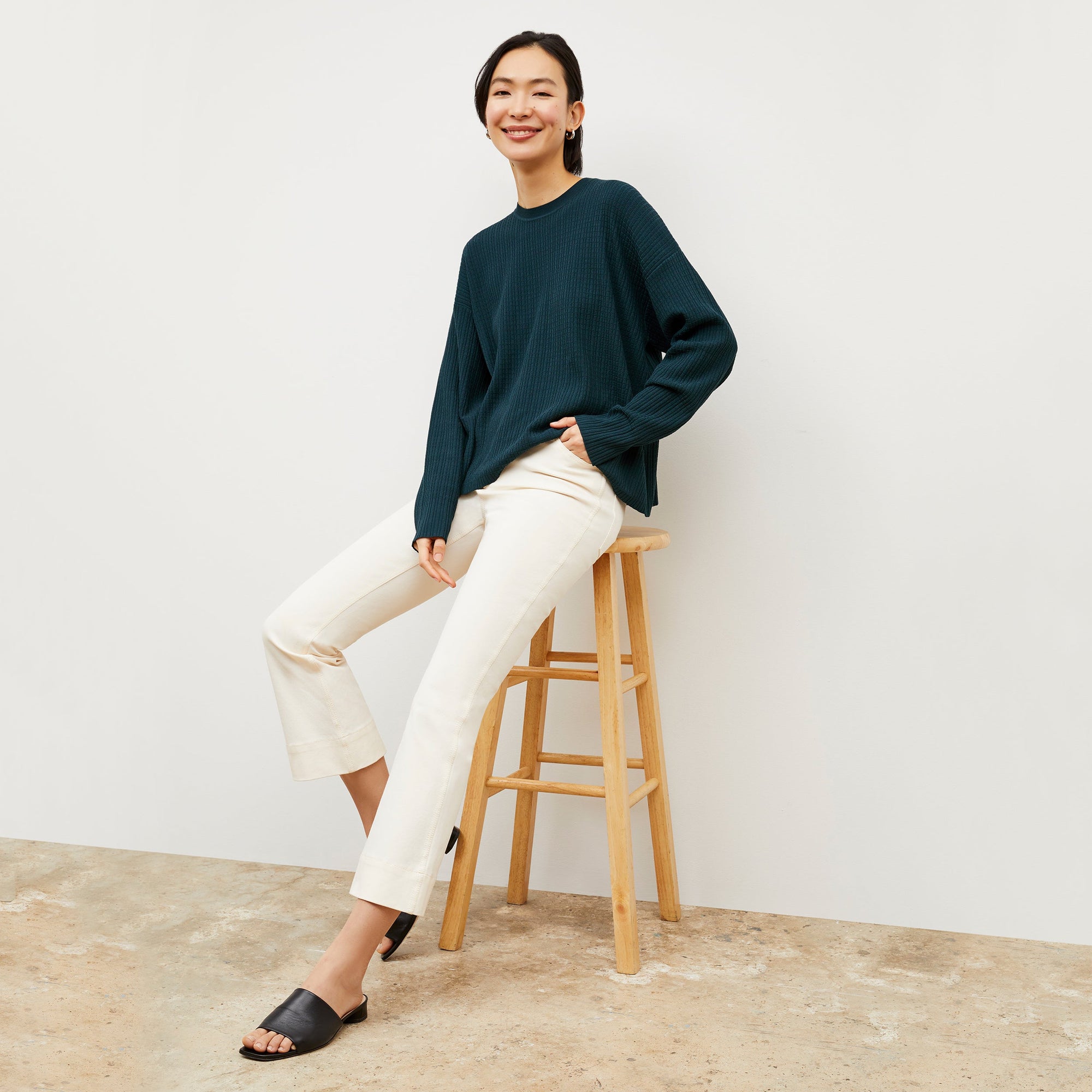 Front image of a woman wearing the Archie Jean in Black | Exclude