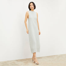 Woman standing wearing the Ella Sandal in Silver