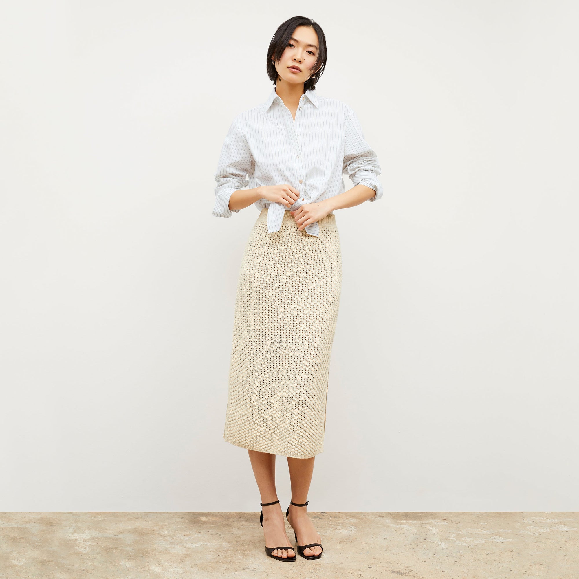 Front image of a woman wearing the Mila Button Down - Poplin Stripe in Blue / Ivory
