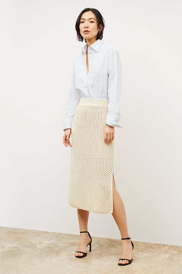 Front image of a woman wearing the Mila Button Down - Poplin Stripe in Blue / Ivory | Exclude