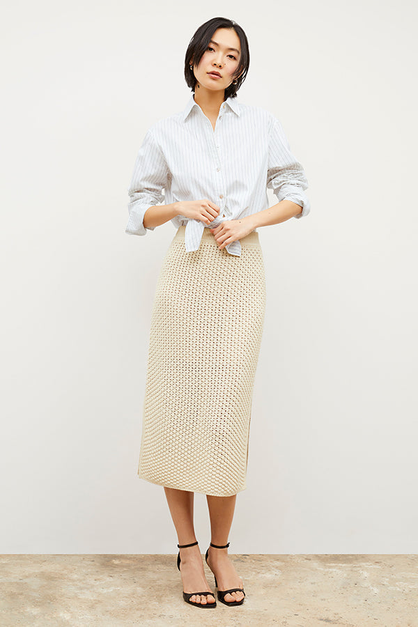 Front image of a woman wearing the Mila Button Down - Poplin Stripe in Blue / Ivory | Exclude