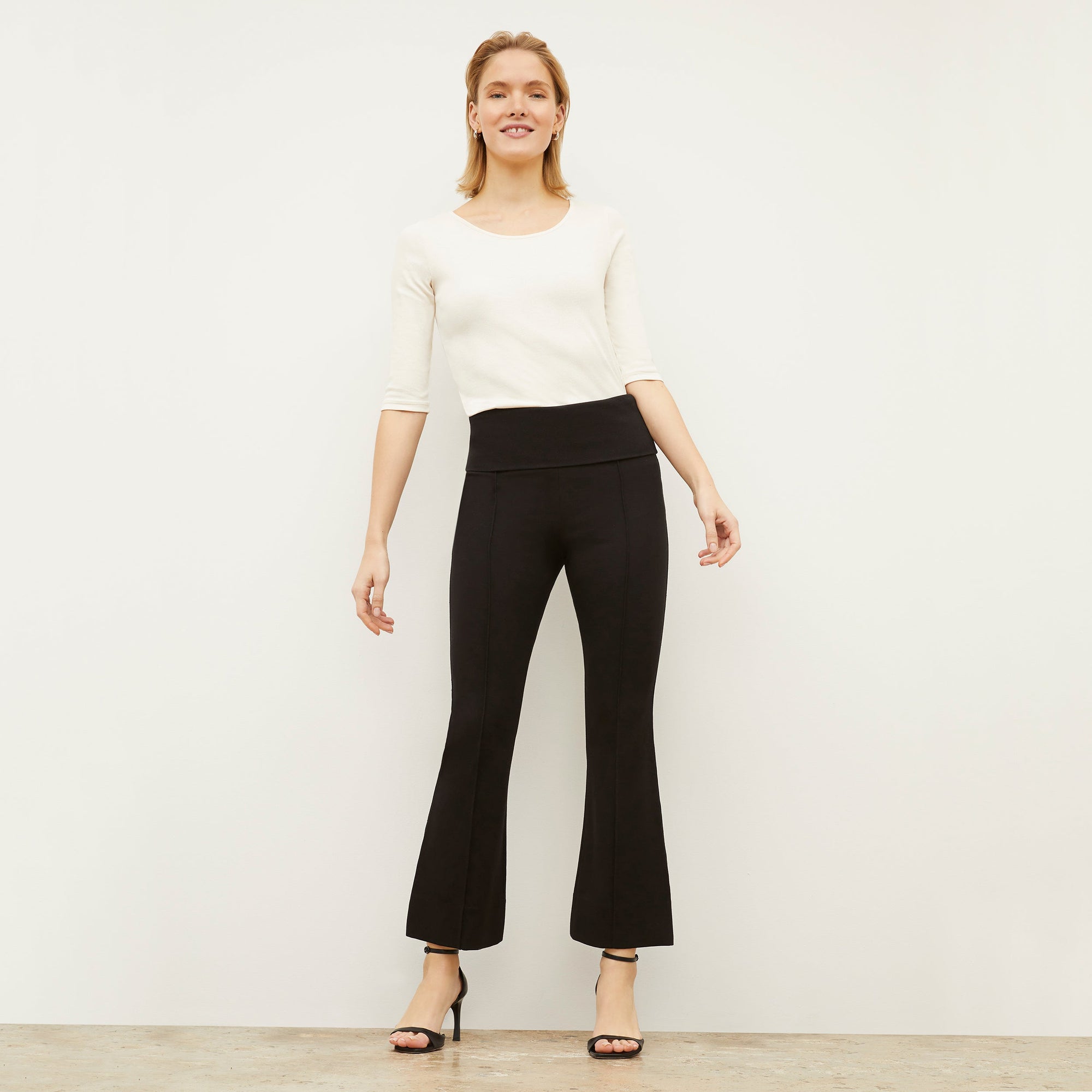 Front image of a woman wearing the Soyoung top in Ivory