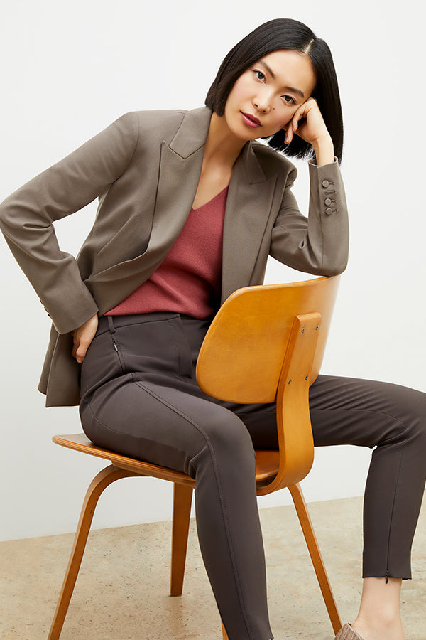 Side image of a woman wearing the Curie Pant in Dark Mink | Exclude