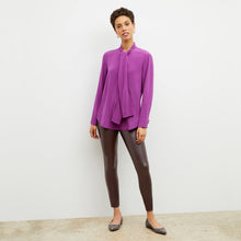 Front image of a woman wearing the harrington in brown | Lead