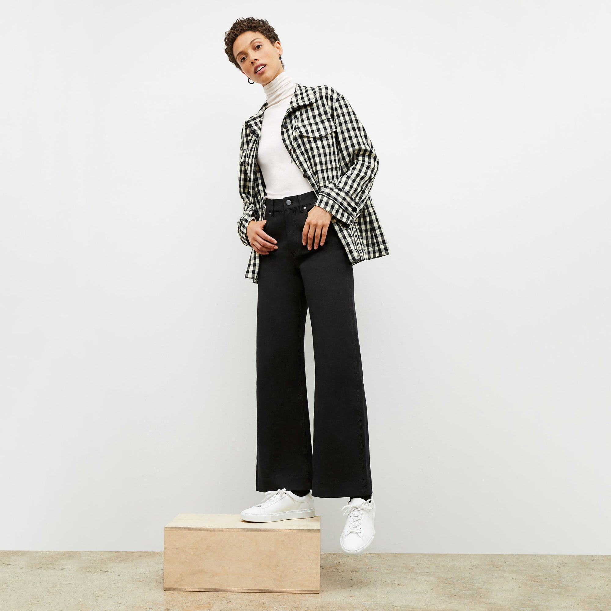 Front image of a woman wearing the Milo Jean in Black | Exclude